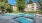 Sparkling blue, heated outdoor pool and hot tub