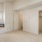 Large bedroom with a window seat and walk-in closet